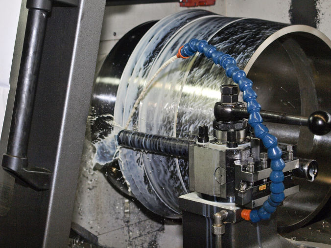 image of a lathe turning metal